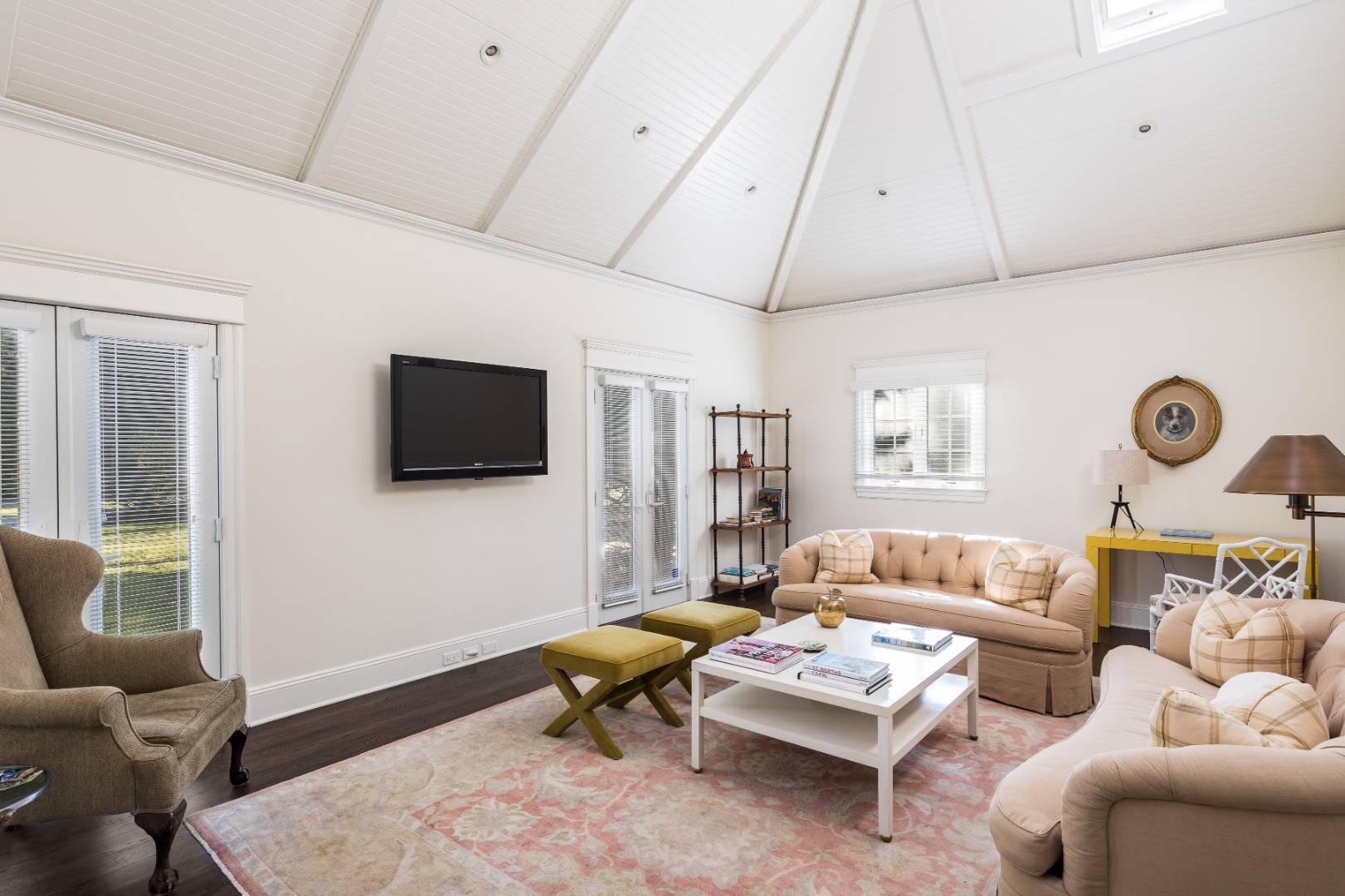 23 Basket Neck Lane Remsenburg, NY 11960 - Photo 8 of 17 a living room with furniture a flat screen tv and a window