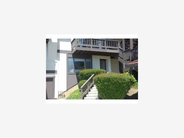 504 Monterey Road, Unit O Pacifica, CA 94044 - Photo 2 of 9 a picture of a house with a outdoor space