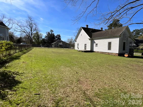 a house with yard in front of it