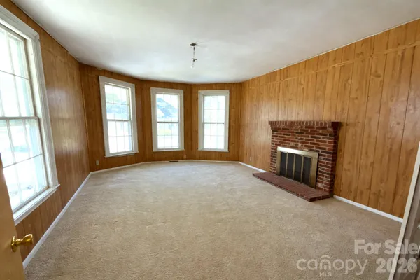 an empty room with windows