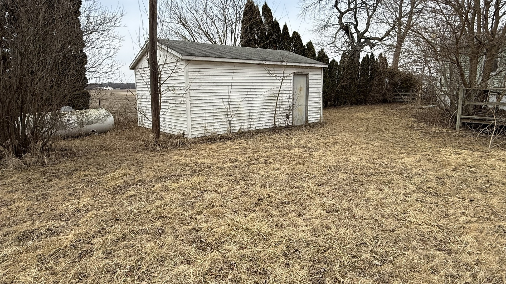 4103 East Oaks Road Urbana, IL 61802 - Photo 5 of 5 a view of backyard and wooden fence