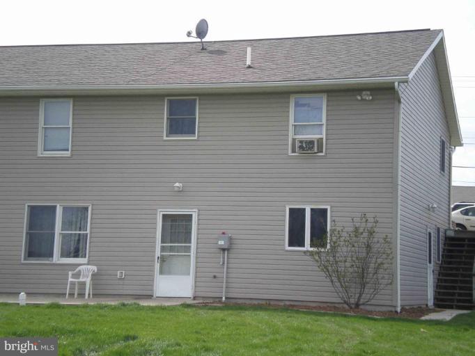 9130 Letzburg Road Mercersburg, PA 17236 - Photo 4 of 8 a front view of a house with a yard