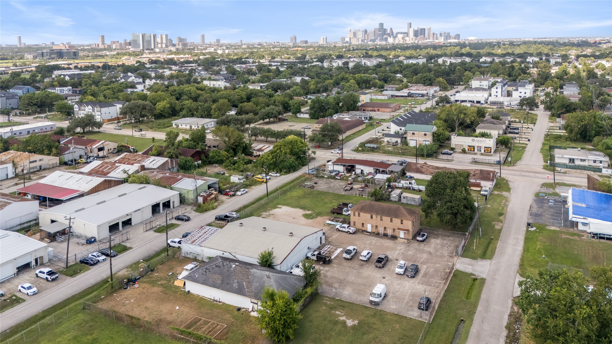 6920 Winton Street Houston, TX 77021 - Photo 2 of 14 an aerial view of a city with lots of residential buildings