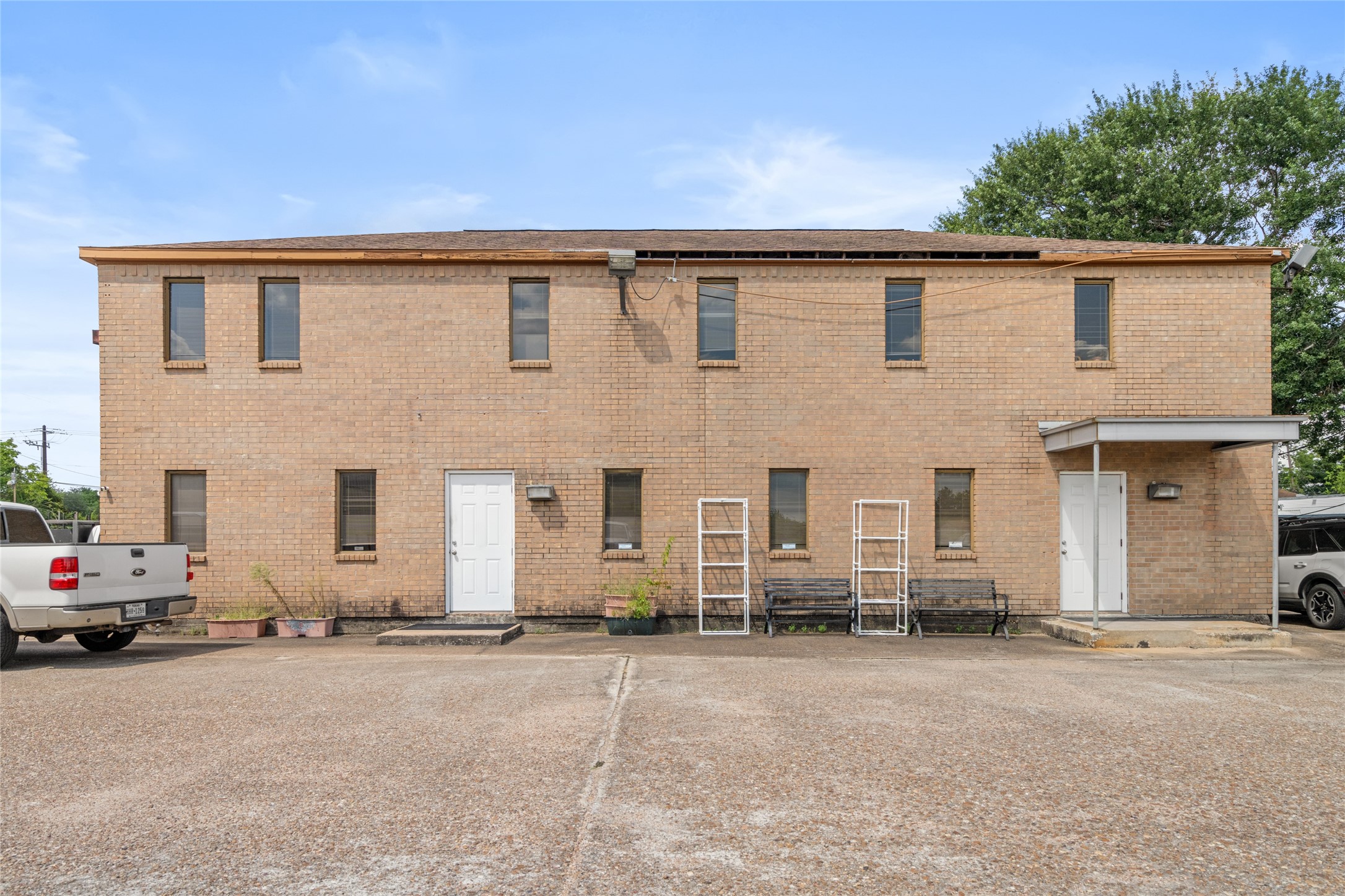 6920 Winton Street Houston, TX 77021 - Photo 10 of 14 a view of a house with a road