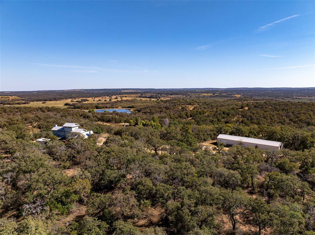 1775 Sunset Mountain Road Lipan, TX 76462 - Photo 6 of 34 an aerial view of multiple house