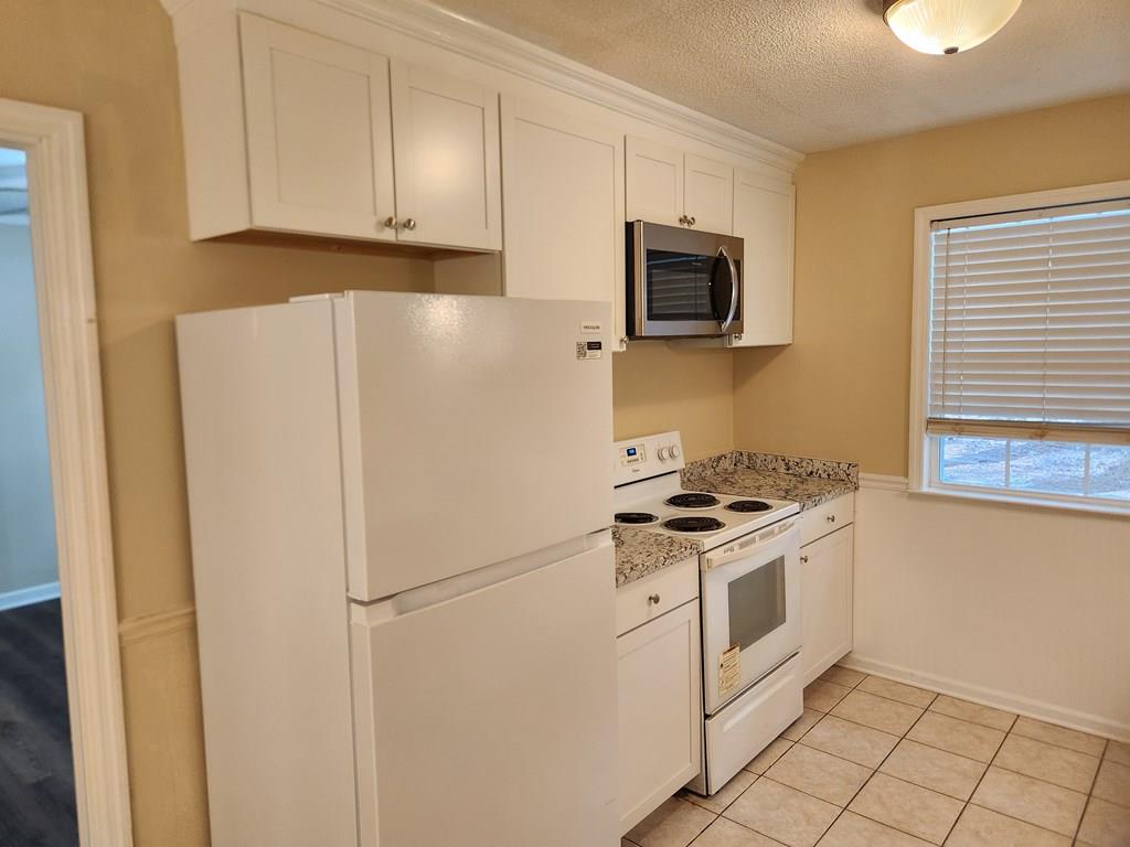 1005 Harris Road Ozark, AL 36360 - Photo 10 of 31 Kitchen, New Refrigerator & Over Stove Microwave