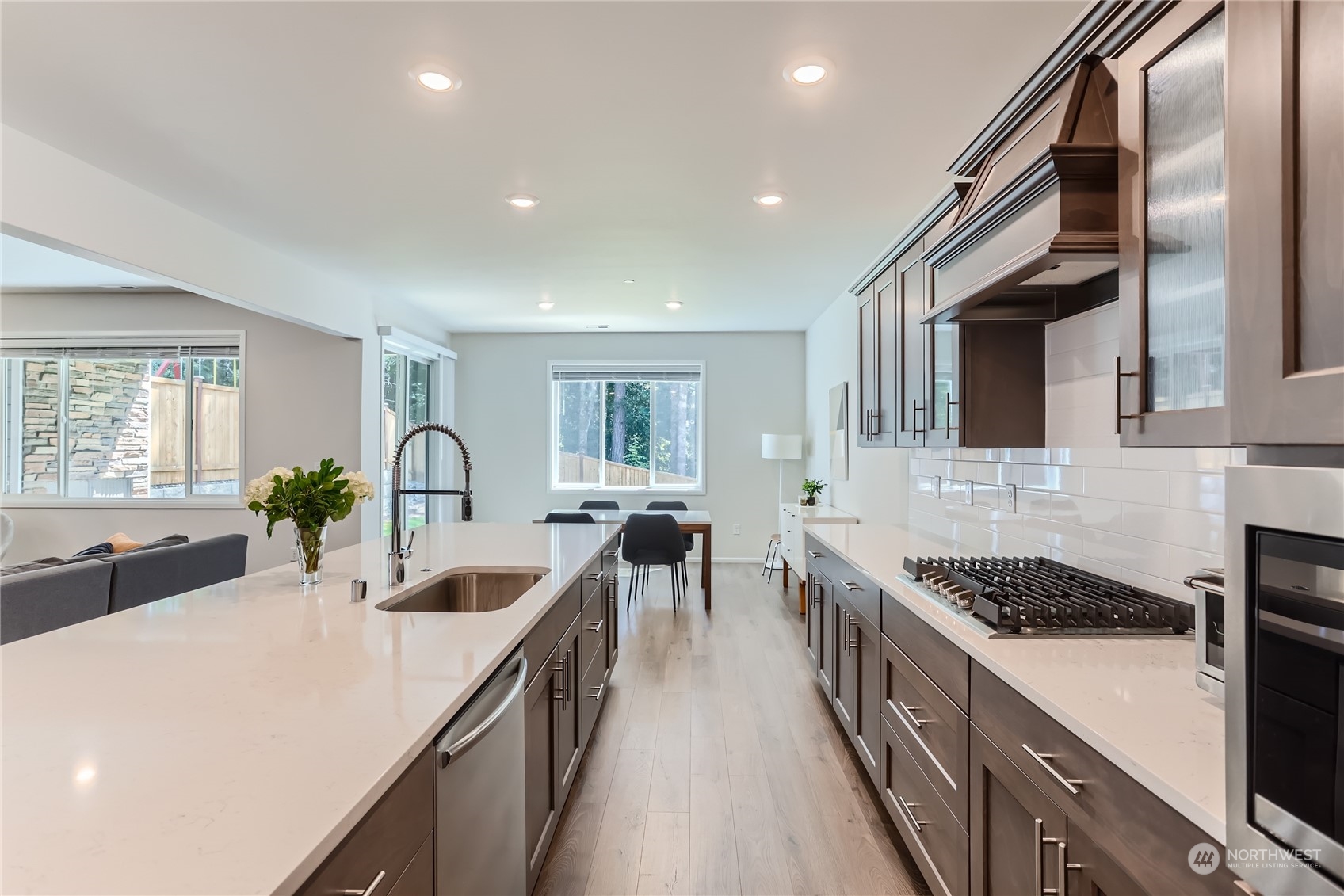4126 235th Place Southeast Bothell, WA 98021 - Photo 13 of 28 a kitchen with sink a stove and cabinets
