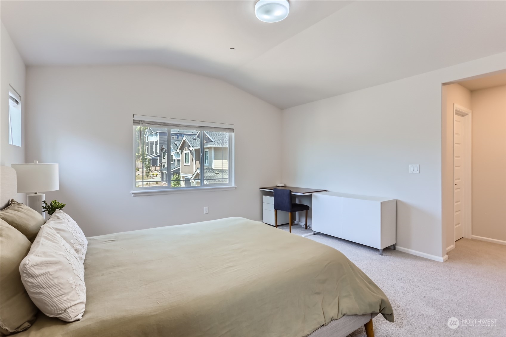 4126 235th Place Southeast Bothell, WA 98021 - Photo 17 of 28 a bedroom with a bed and a window