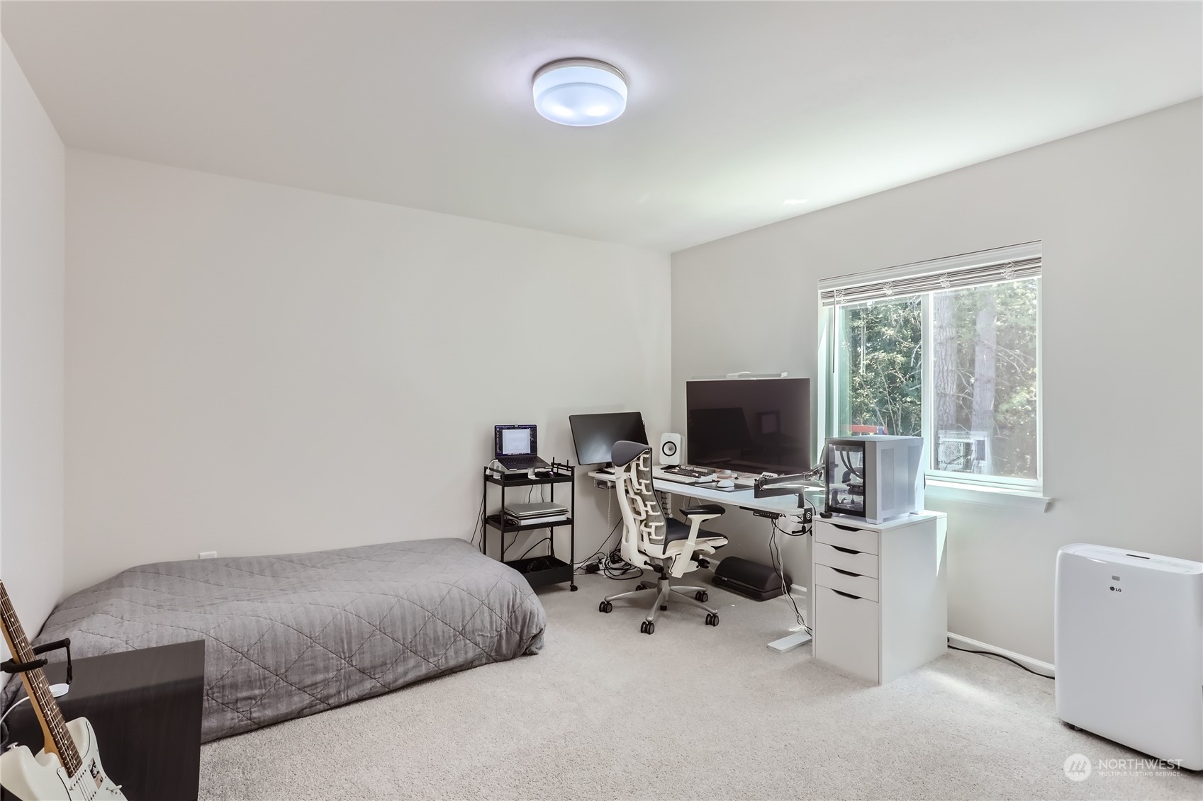 4126 235th Place Southeast Bothell, WA 98021 - Photo 22 of 28 a view of a workspace with a window