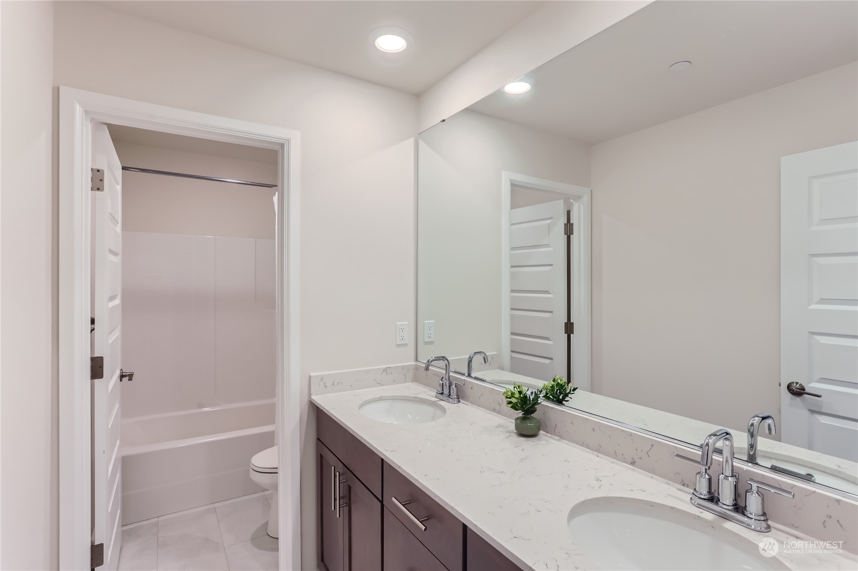 4126 235th Place Southeast Bothell, WA 98021 - Photo 23 of 28 a bathroom with a granite countertop sink toilet and shower