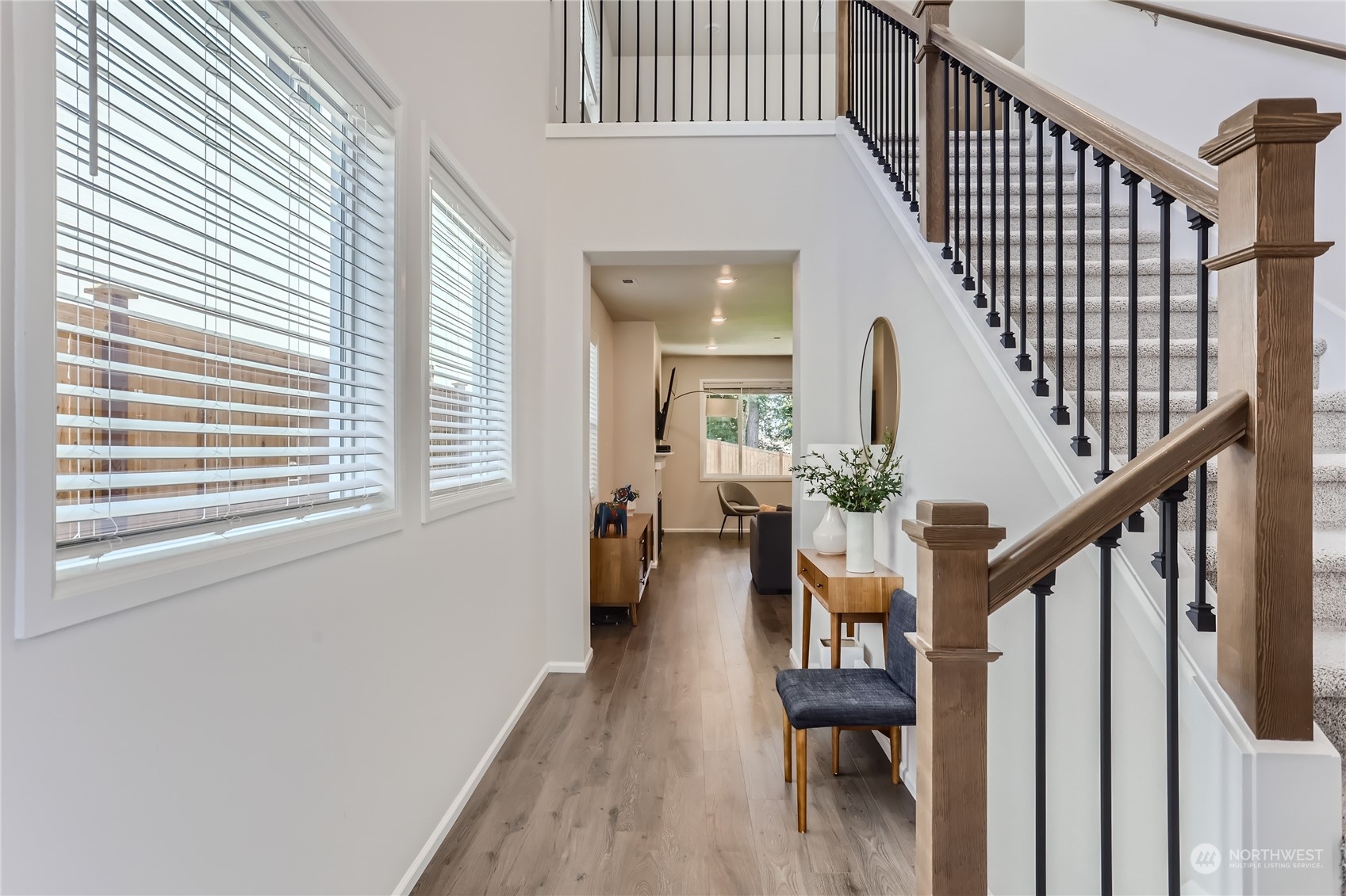4126 235th Place Southeast Bothell, WA 98021 - Photo 5 of 28 a view of entryway and hall with wooden floor