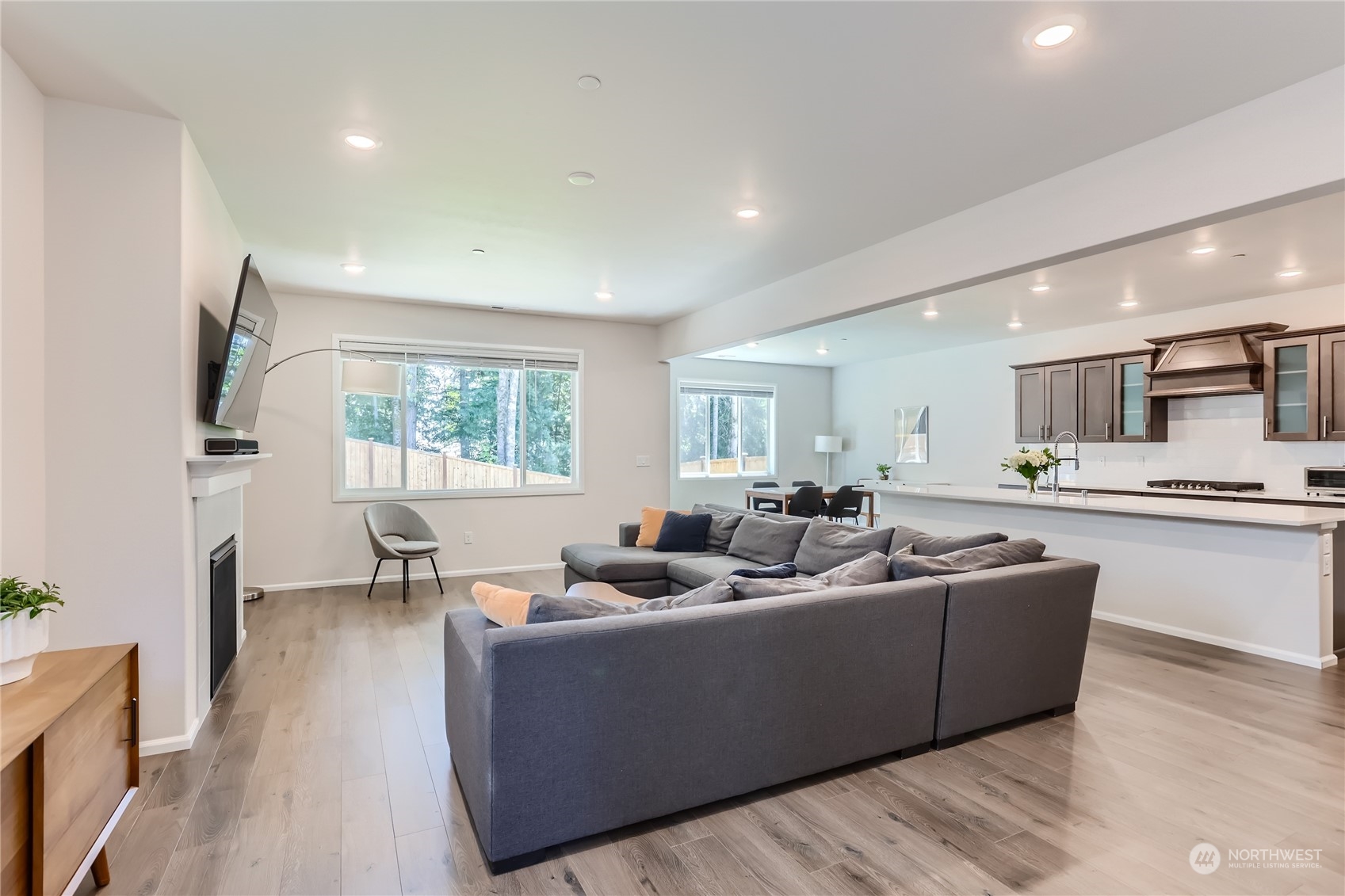 4126 235th Place Southeast Bothell, WA 98021 - Photo 7 of 28 a living room with furniture and a large window