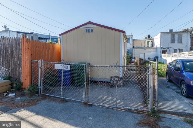 a patio with table and chairs