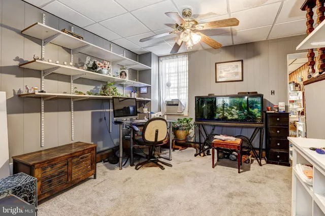 a view of a workspace with furniture