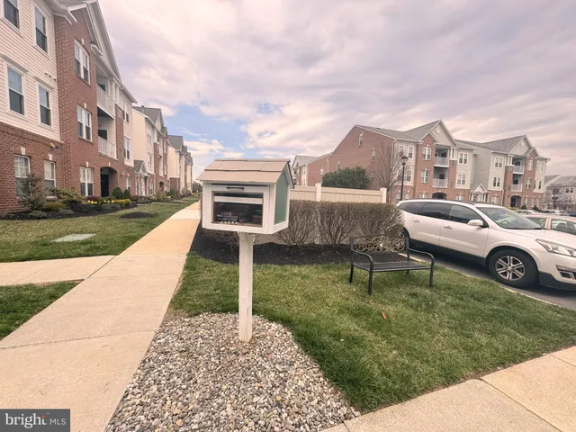a view of a house with a back yard