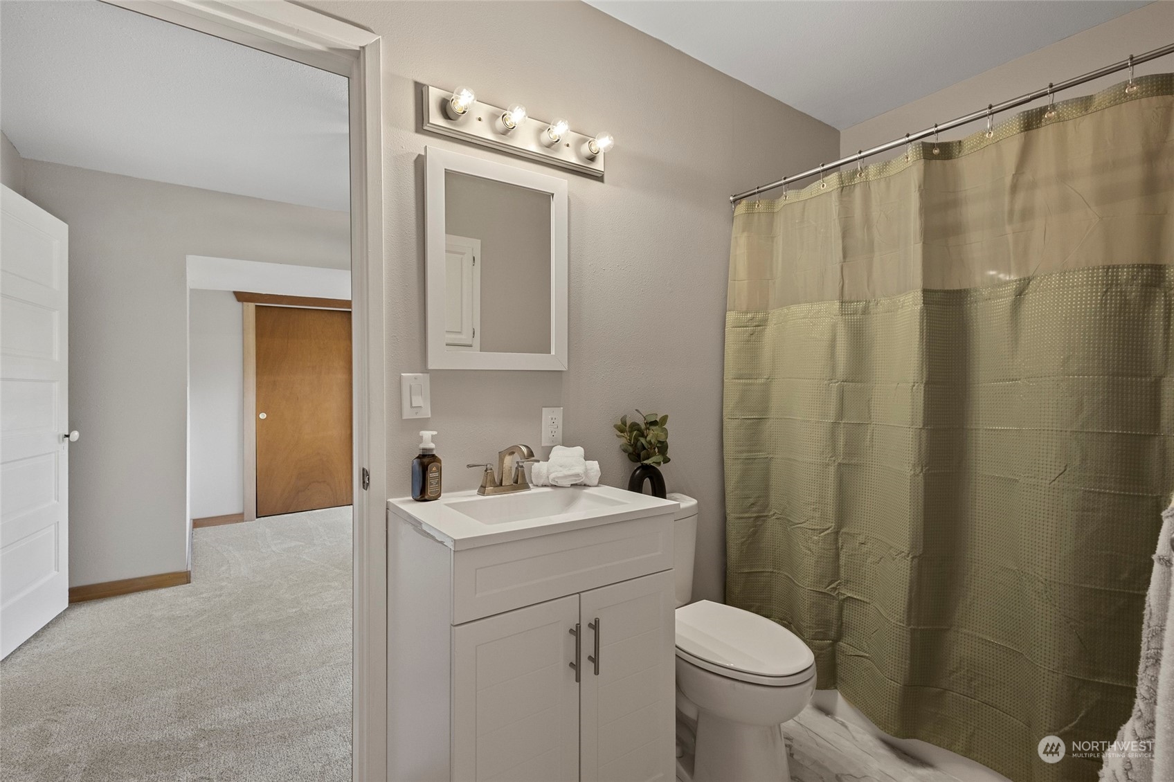 1305 Gohr Road Sultan, WA 98294 - Photo 12 of 27 a bathroom with a sink a toilet and shower