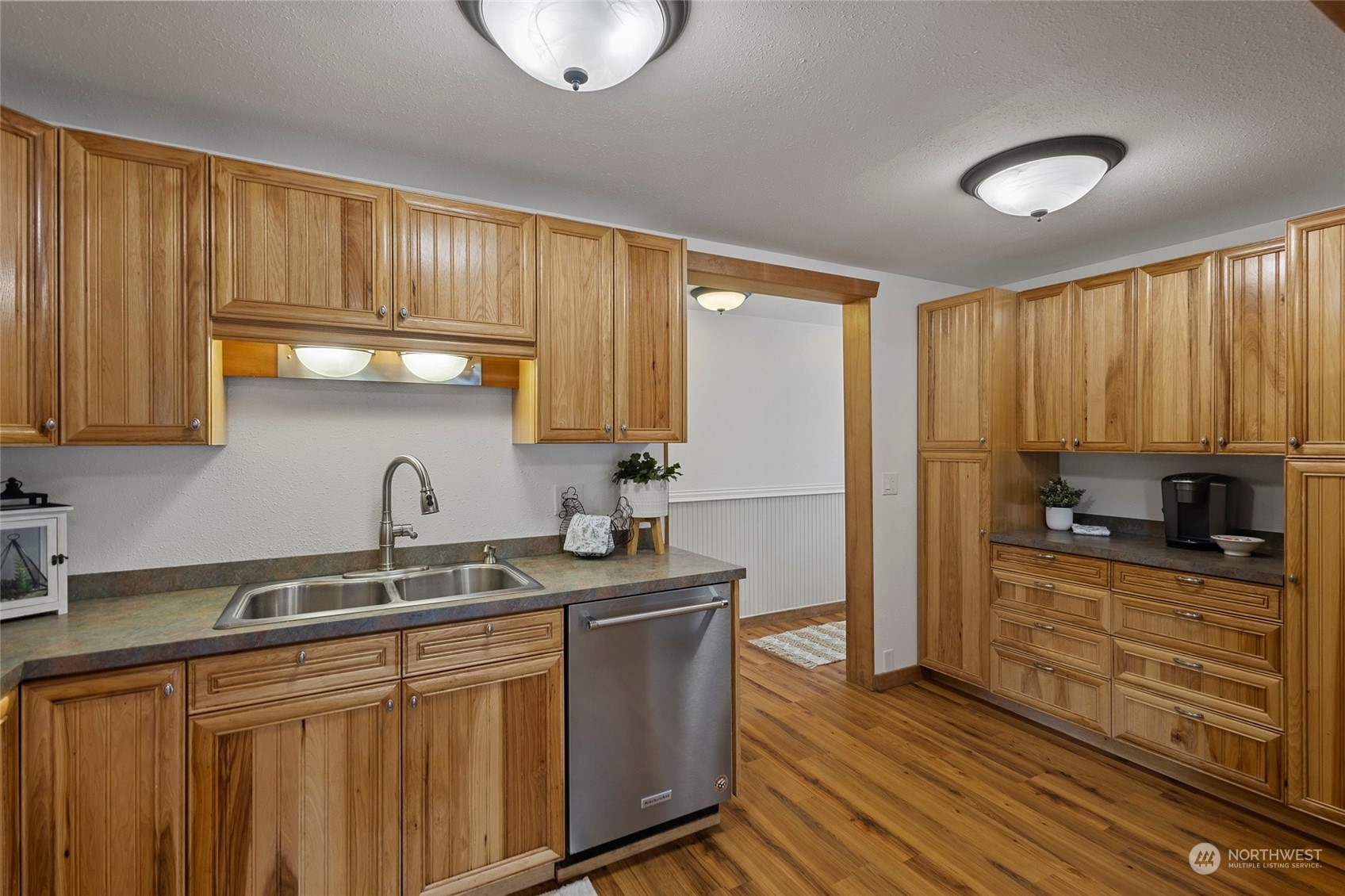 1305 Gohr Road Sultan, WA 98294 - Photo 8 of 27 a kitchen with stainless steel appliances granite countertop a sink stove and cabinets