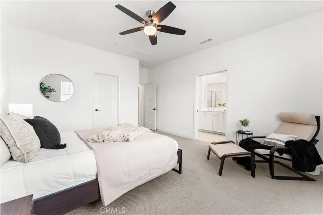 a bathroom with a shower sink and mirror