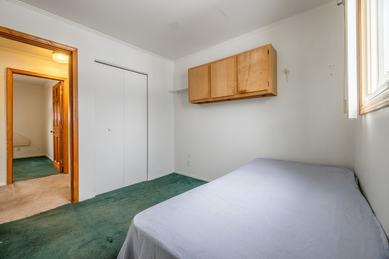 332 Hadleigh Road Bolingbrook, IL 60440 - Photo 11 of 16 a bedroom with a bed and a window