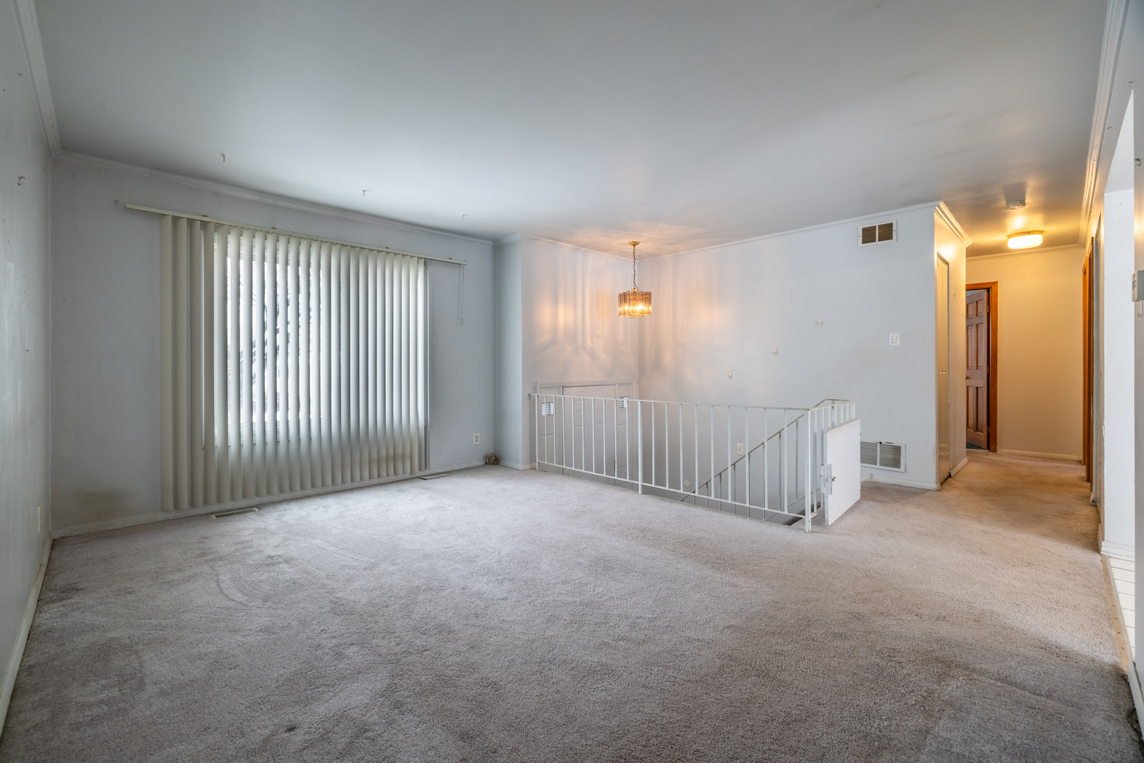 332 Hadleigh Road Bolingbrook, IL 60440 - Photo 6 of 16 a view of a livingroom with a staircase