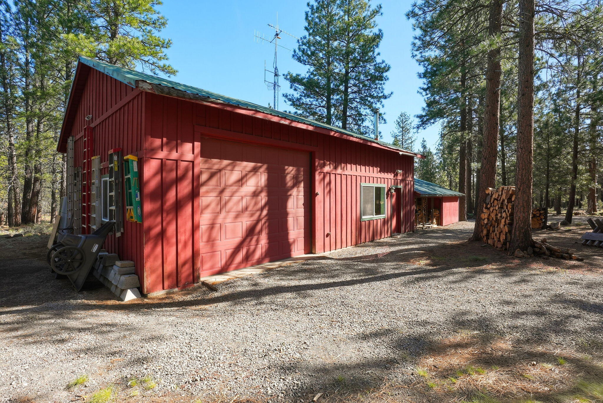 15020 Remuda Road Sisters, OR 97759 - Photo 42 of 61 28'x30' shop includes 28'x16' RV bay with 9'10" x 11'10" roll up door plus two additional 22'x14' rooms
