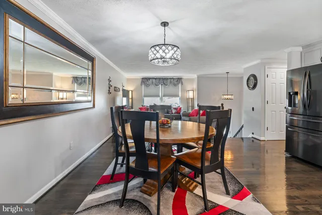 a bedroom with a bed and a desk