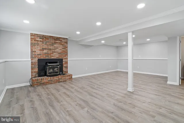 a view of a yard with large trees