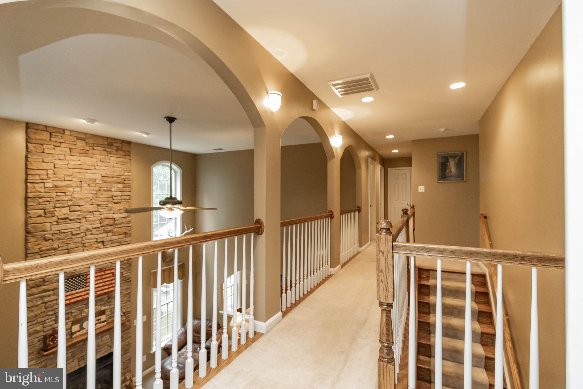 10086 Settle School Road Rixeyville, VA 22737 - Photo 24 of 72 Upstairs hallway open to below.
