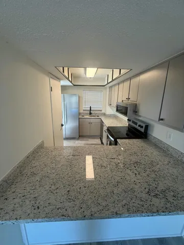 a living room with a couch and a coffee table