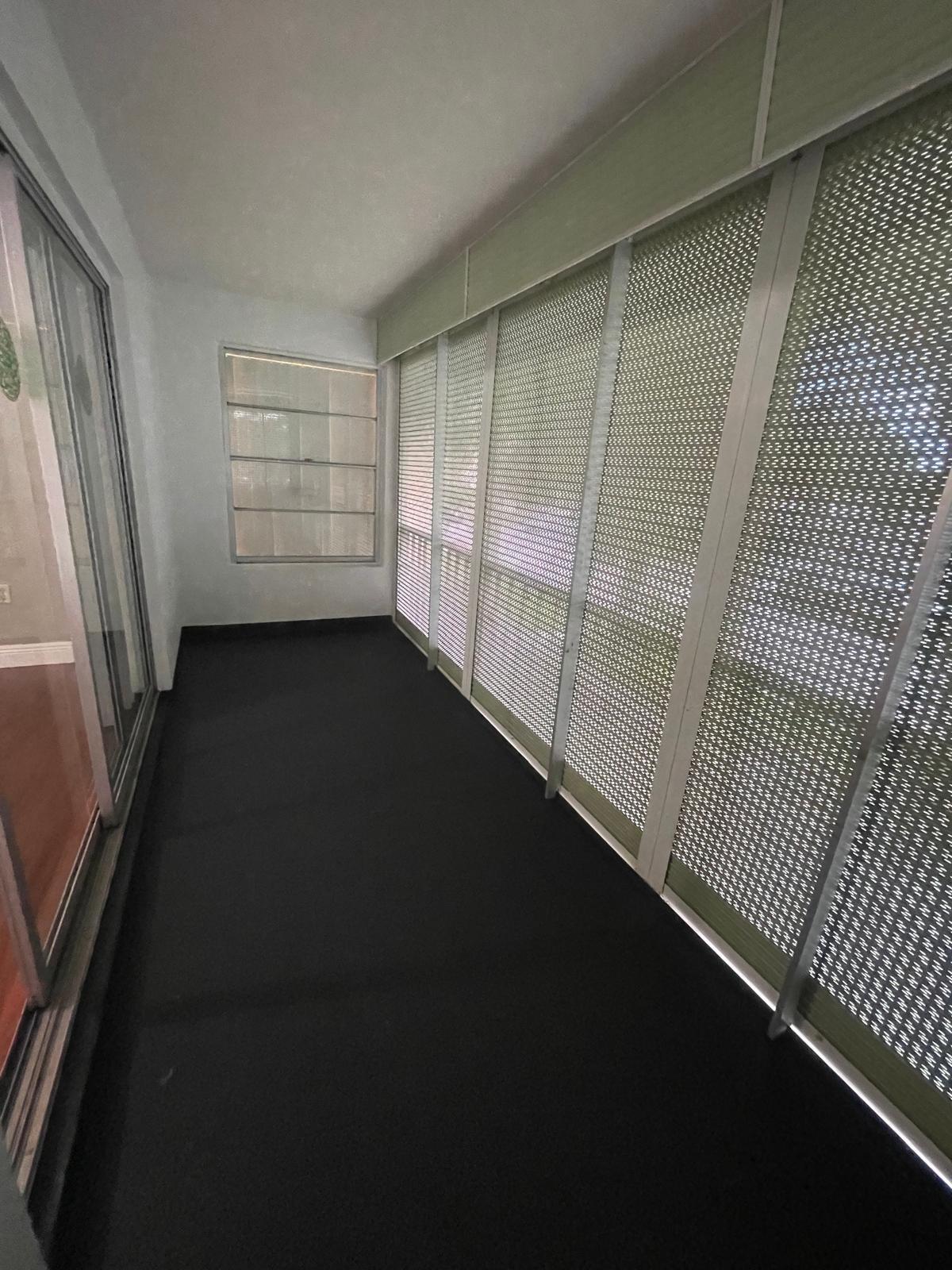 4156 Inverrary Drive, Unit 202 Lauderhill, FL 33319 - Photo 14 of 14 en empty room with windows