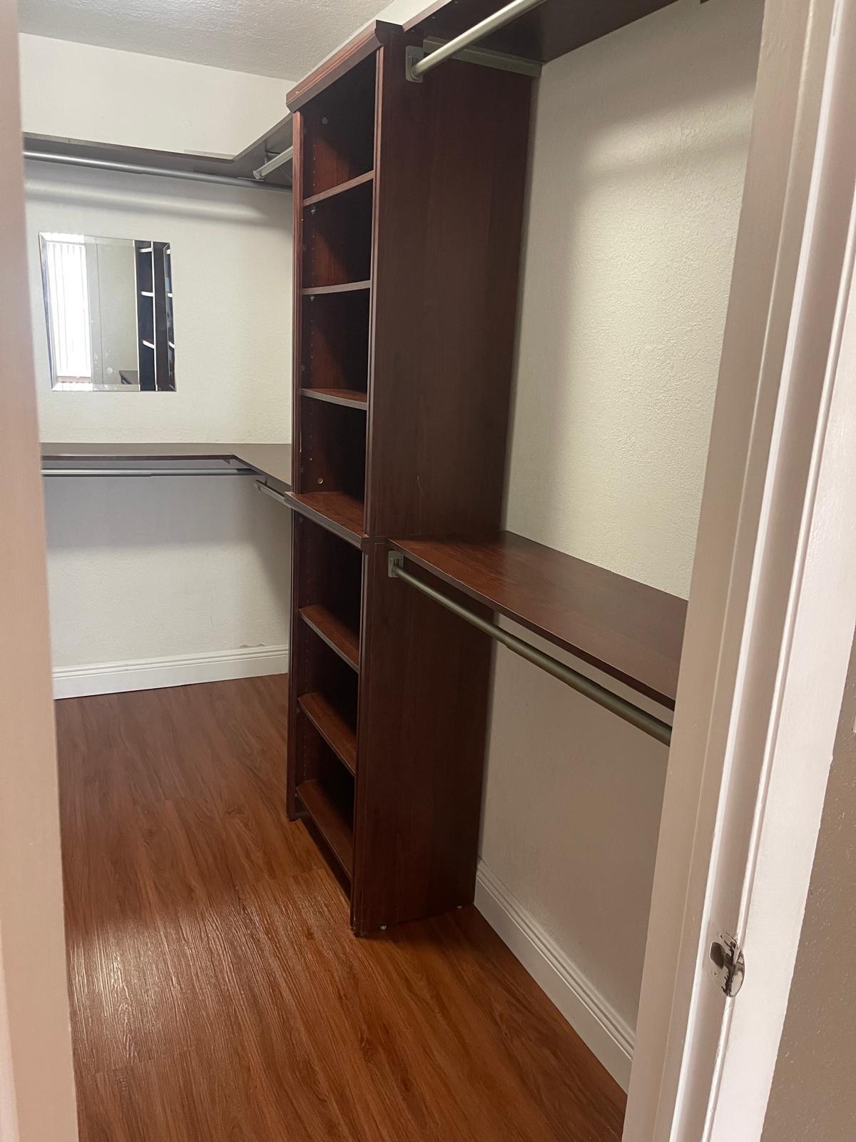 4156 Inverrary Drive, Unit 202 Lauderhill, FL 33319 - Photo 4 of 14 a view of walk in closet with empty racks