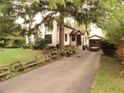 151 Waverly Road Porter, IN 46304 - Photo 1 of 10 a front view of a house with a yard