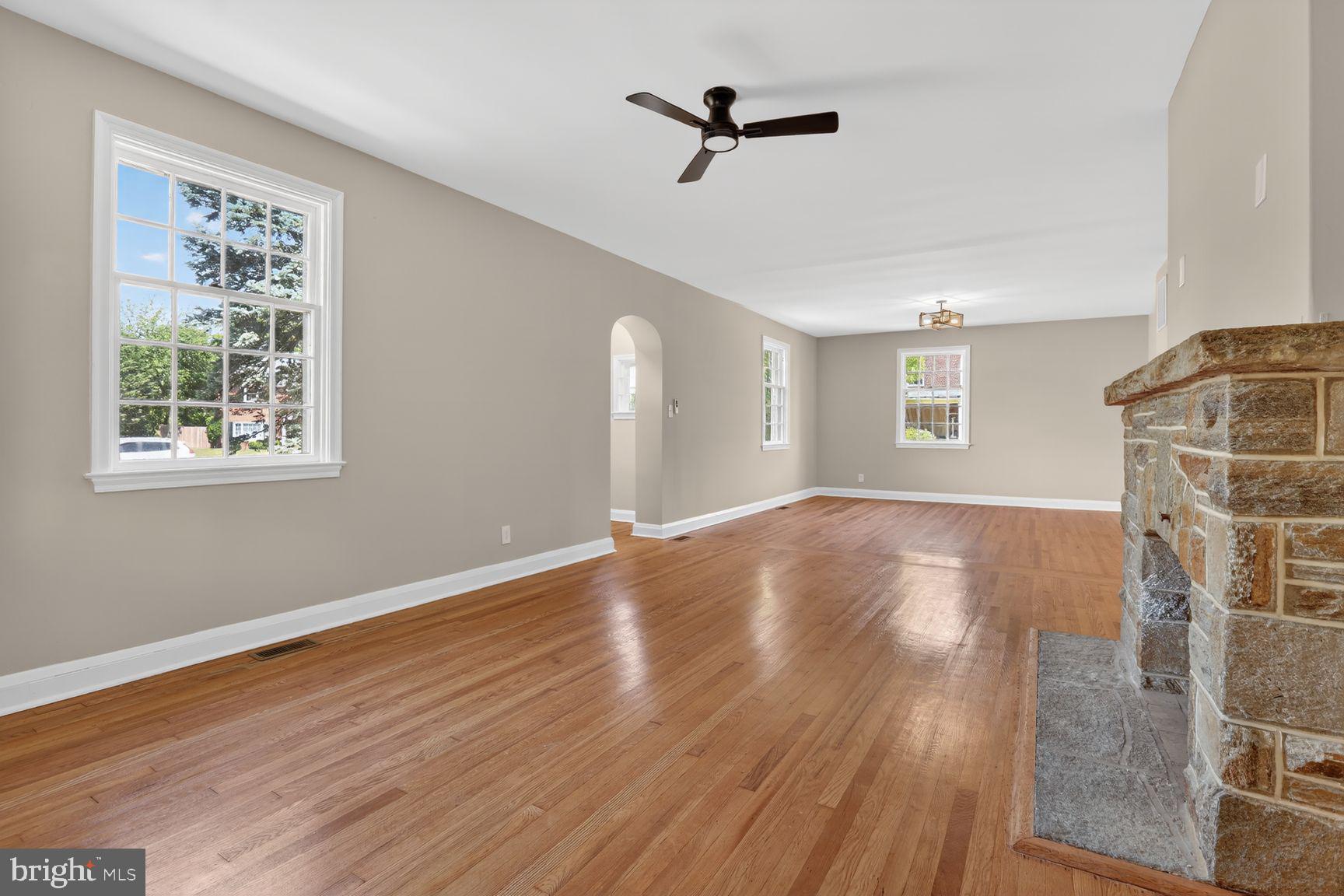 315 East Cold Spring Lane Baltimore, MD 21212 - Photo 20 of 25 a view of empty room with wooden floor and fan