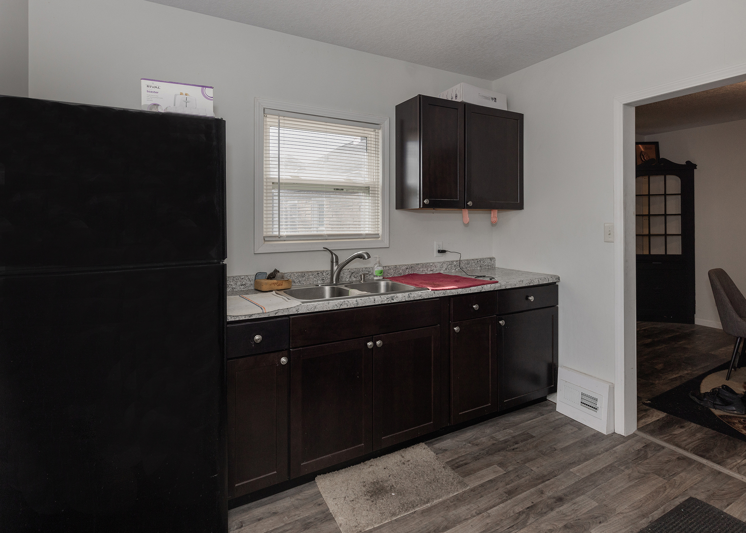 1717 6th Street Rock Island, IL 61201 - Photo 12 of 25 a bathroom with a sink and a mirror