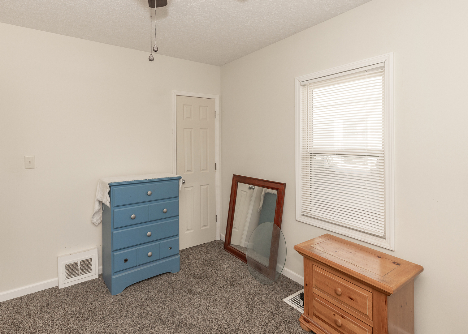 1717 6th Street Rock Island, IL 61201 - Photo 18 of 25 a room with window and a dresser