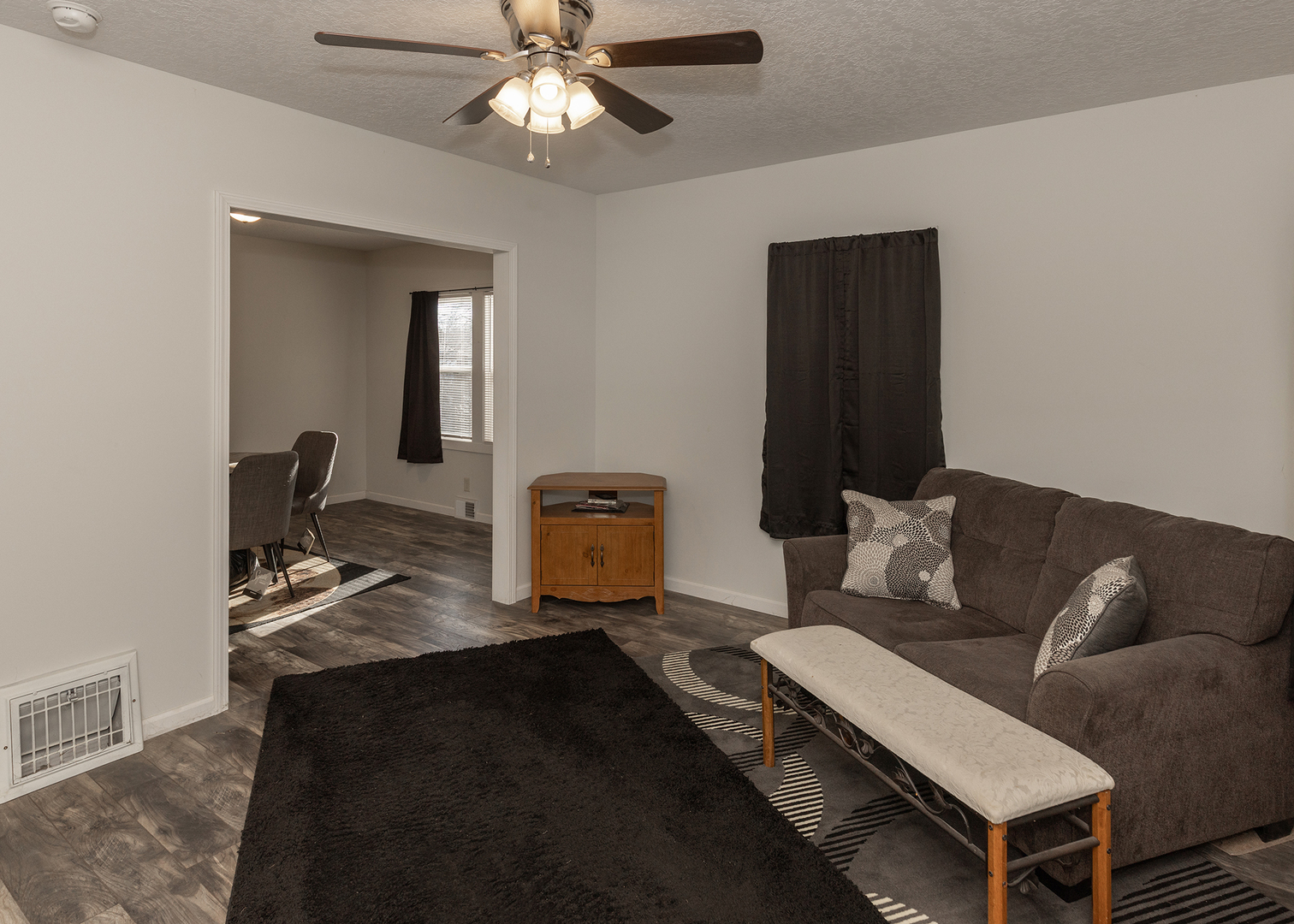 1717 6th Street Rock Island, IL 61201 - Photo 6 of 25 a living room with furniture a two lamp and a window