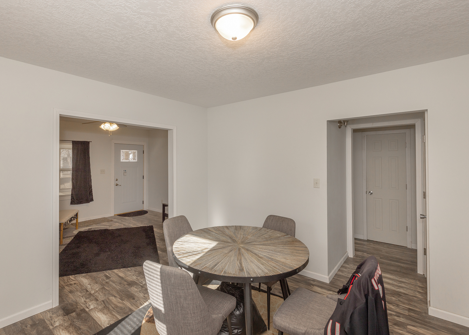 1717 6th Street Rock Island, IL 61201 - Photo 8 of 25 a view of a dining room with furniture and wooden floor