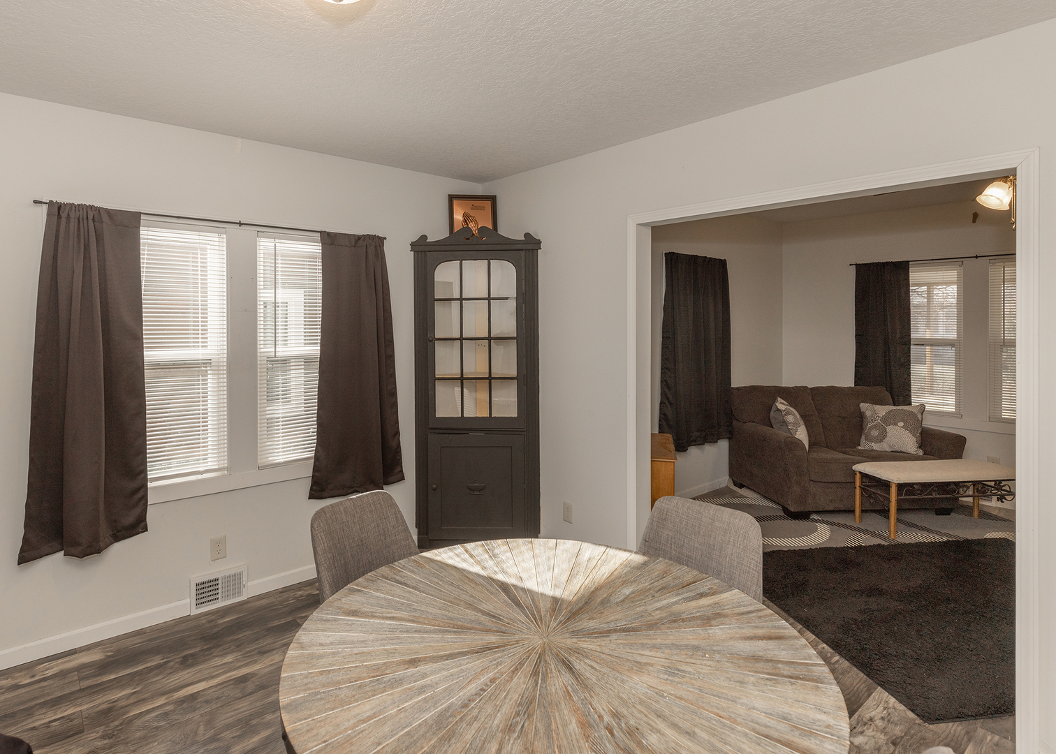 1717 6th Street Rock Island, IL 61201 - Photo 9 of 25 a bedroom with a bed and wooden floor