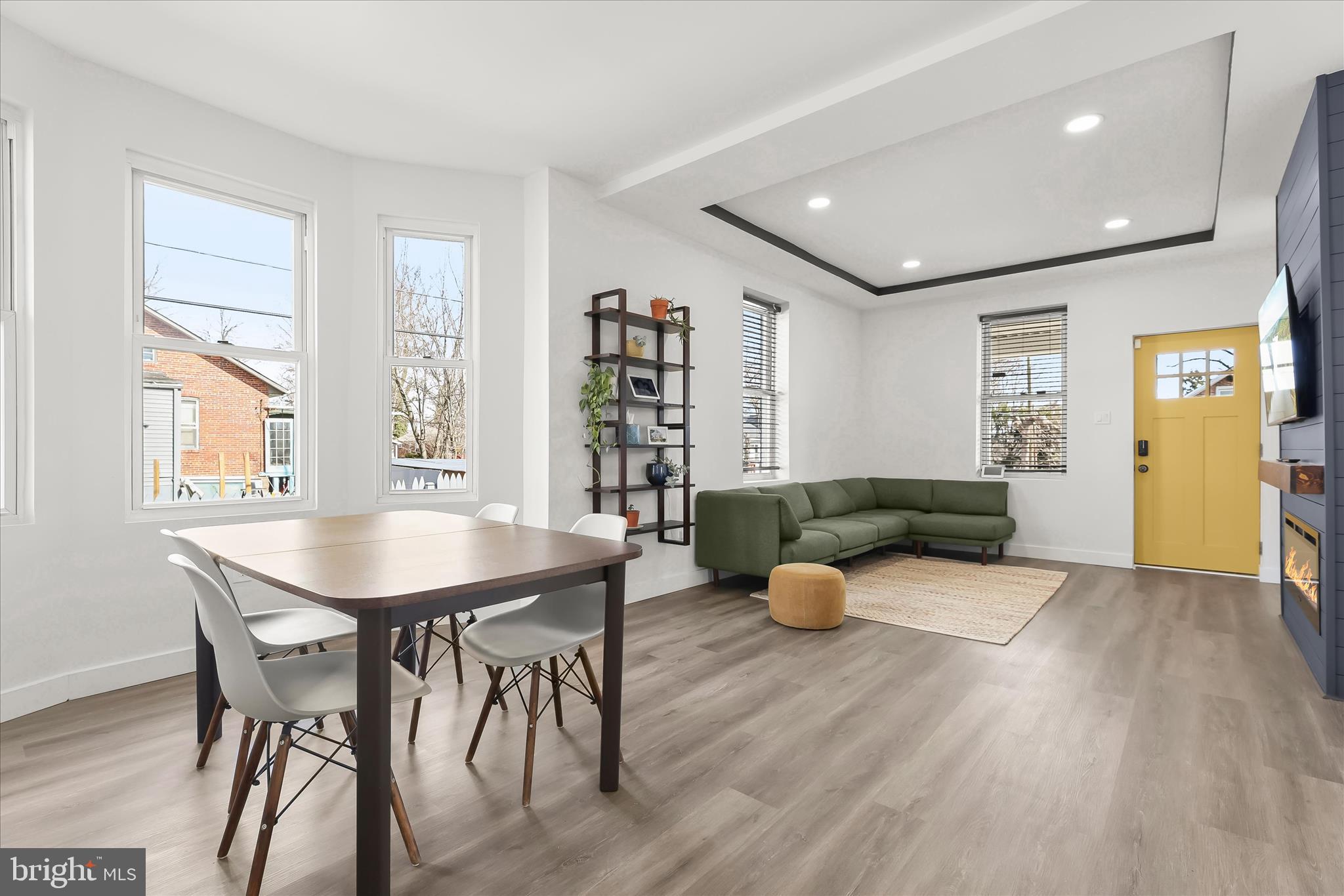 5822 Ethelbert Avenue Baltimore, MD 21215 - Photo 11 of 37 a view of a dining room with furniture and wooden floor