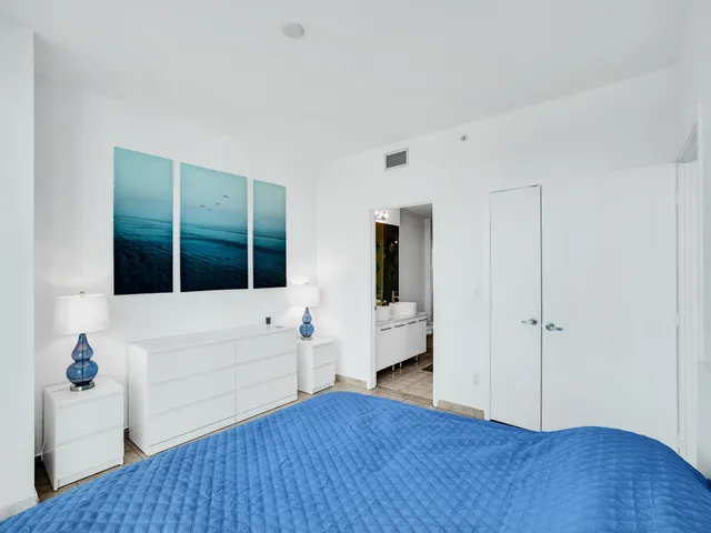 a bathroom with a bathtub and a sink