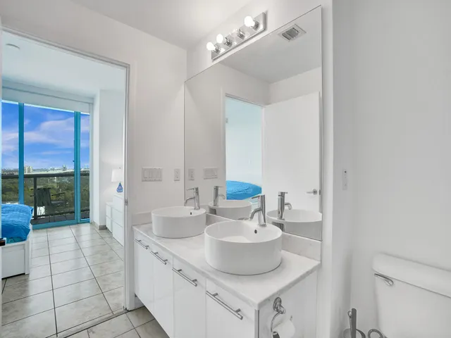 a bathroom with a shower curtain