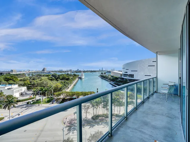 a view of a balcony with lake view