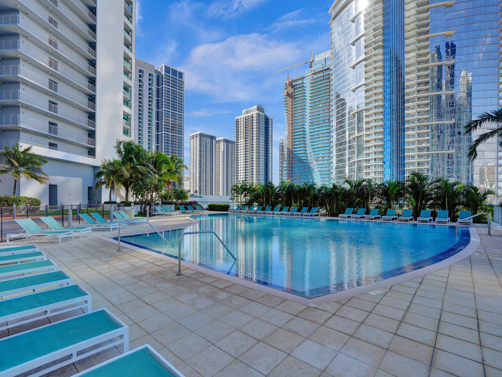 888 Biscayne Boulevard, Unit 811 Miami, FL 33132 - Photo 27 of 48 a view of a swimming pool with outdoor seating