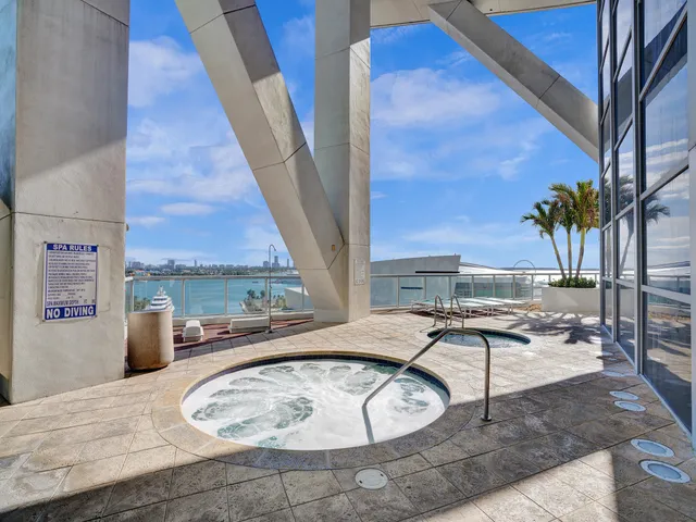 a kitchen with a sink and a stove