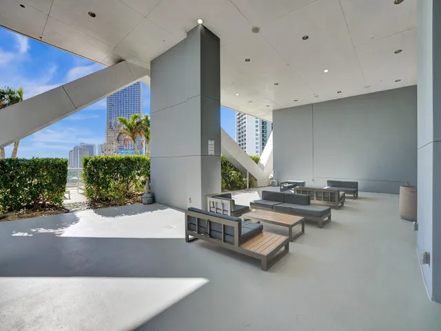 a view of a dining room with furniture and a wooden floor