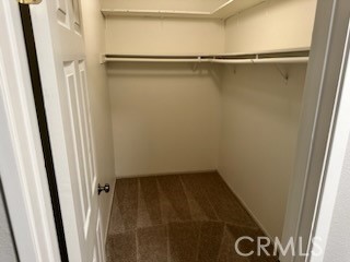 1320 Cadwell Court Riverside, CA 92506 - Photo 17 of 44 a view of closet with wooden floor