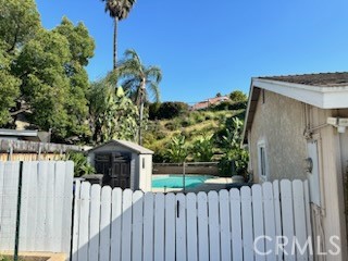 1320 Cadwell Court Riverside, CA 92506 - Photo 44 of 44 a white house that has tree in front of it