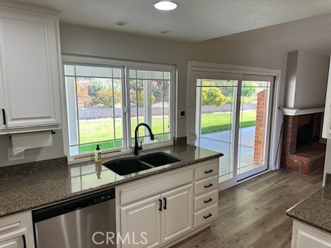 1320 Cadwell Court Riverside, CA 92506 - Photo 9 of 44 a kitchen with a sink and a large window