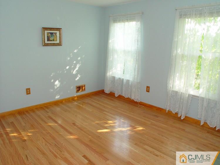 21 Smithwold Road Somerset, NJ 08873 - Photo 12 of 20 a bedroom with a bed and a window