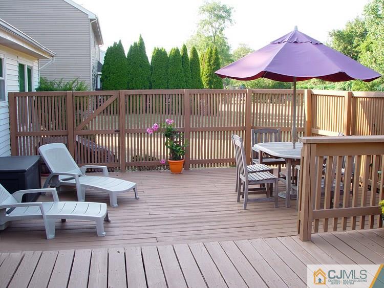 21 Smithwold Road Somerset, NJ 08873 - Photo 15 of 20 a view of a patio with a table and chairs